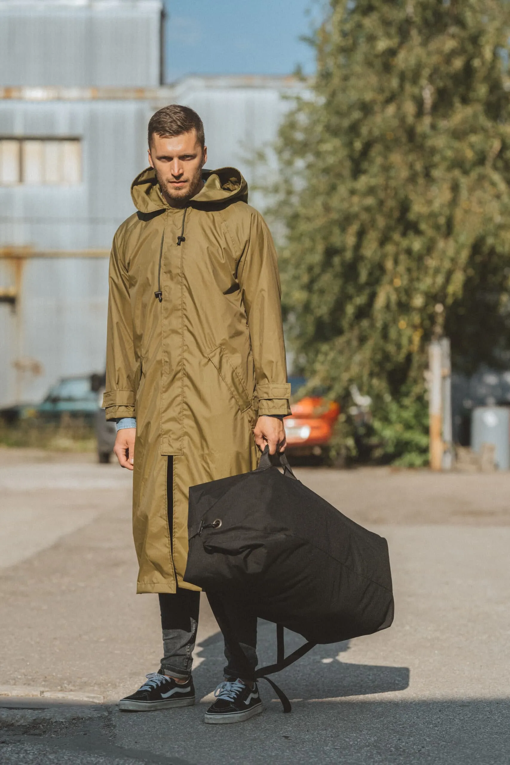 Raincoat - with bag/backpack