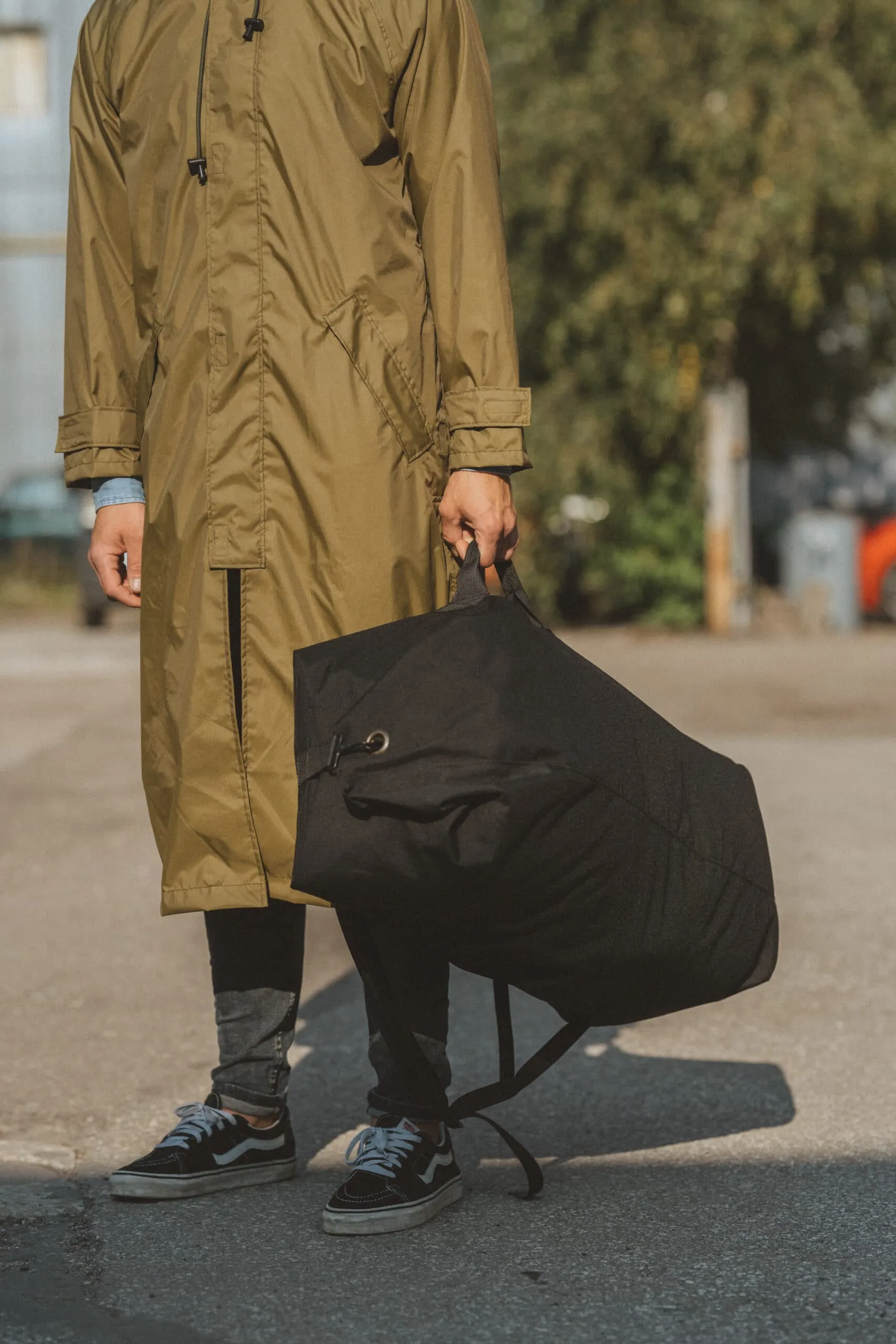 Raincoat - with bag/backpack